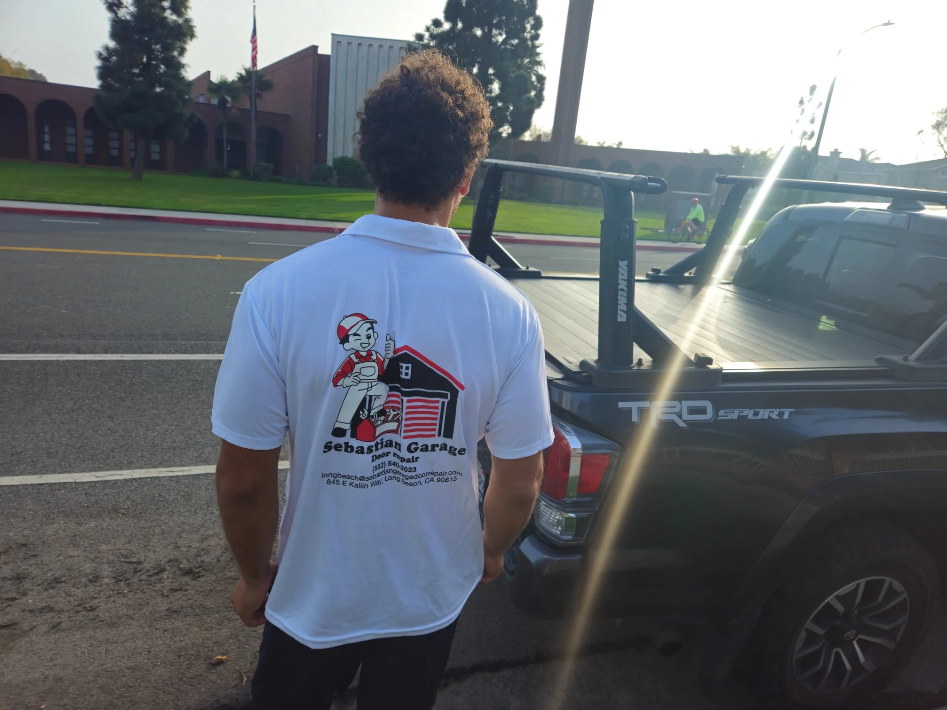 Sebastian technician beside the company truck