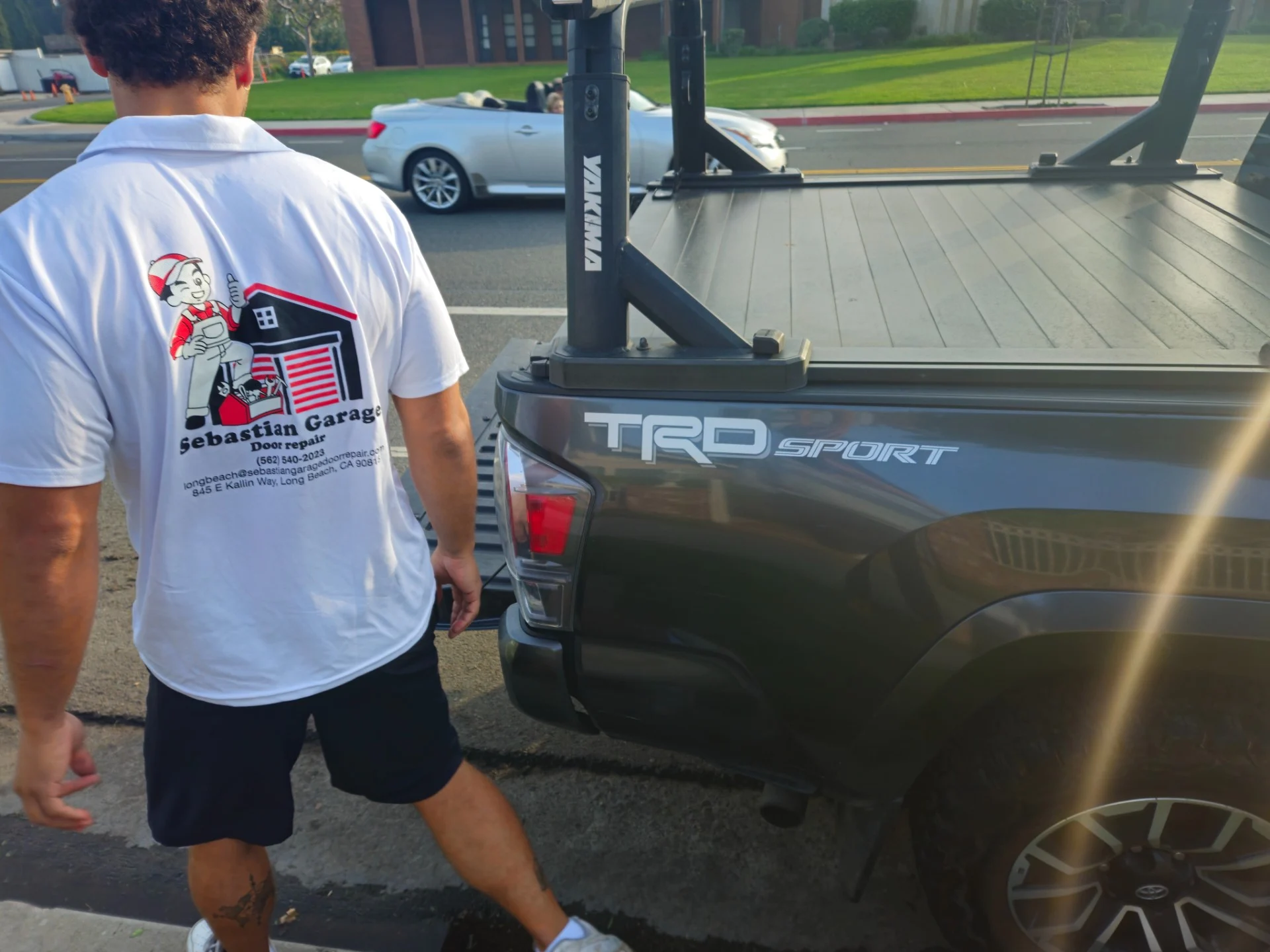 Sebastian technician beside the company truck