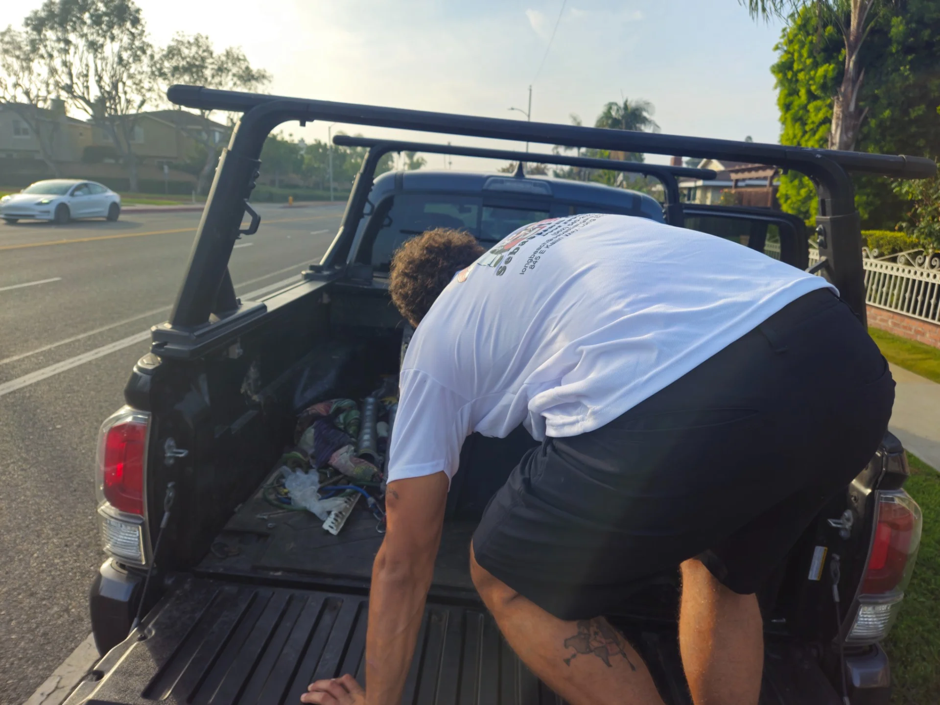 Sebastian technician beside the company truck